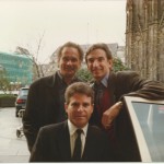 CM, Michael Tilson Thomas & Joshua Robison posing outside next to a car door