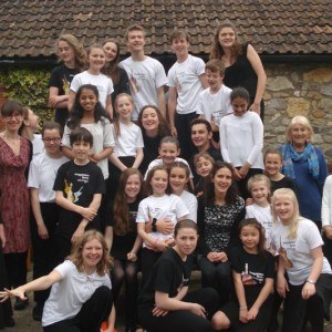 Group photo of the Magdalen Farm Strings course participants (about 25 children plus tutors)