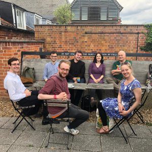 Composers on the course plus Colin Matthews, sitting outside at snape maltings having a drink
