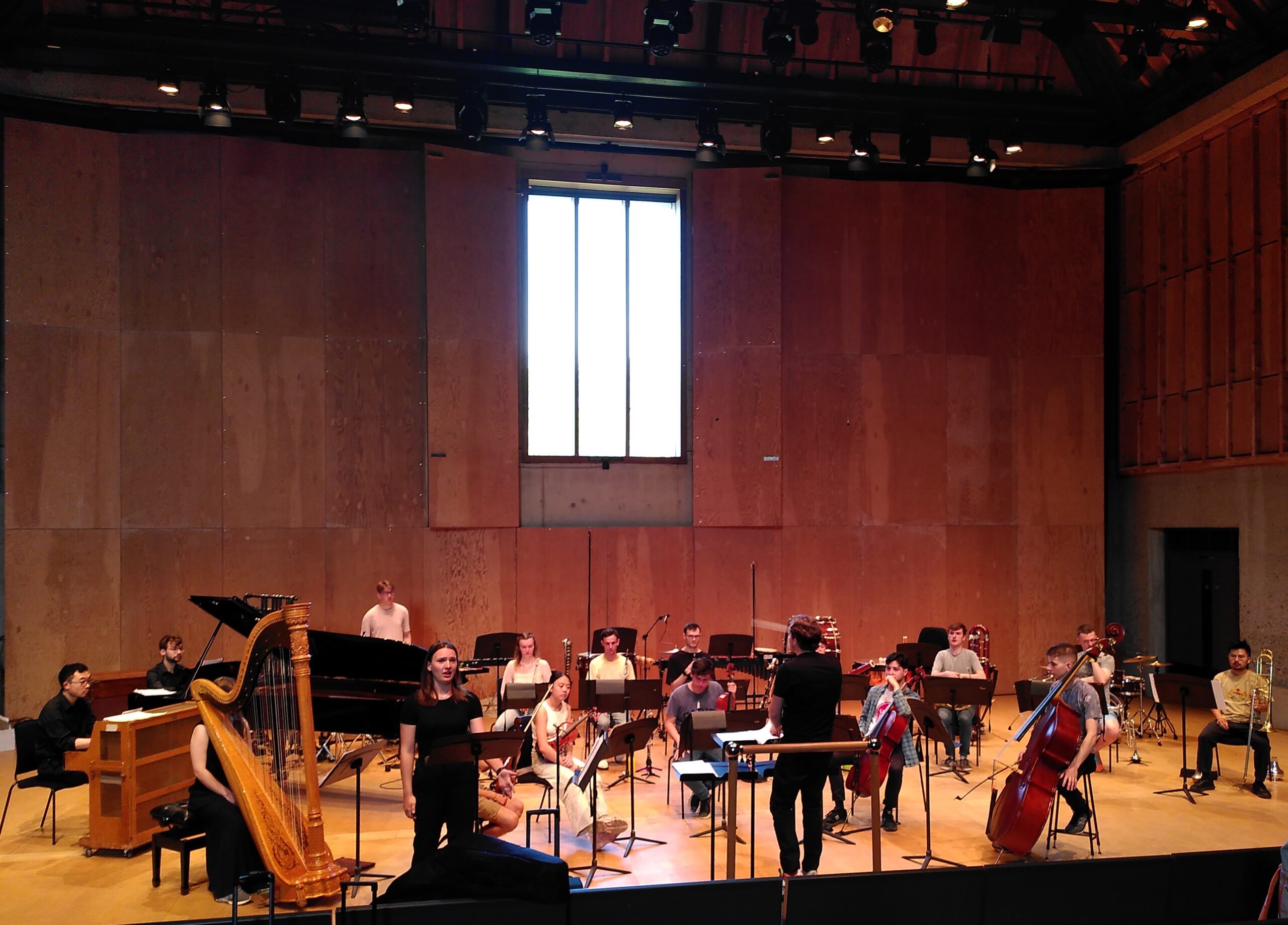 A group of musicians on a concert stage