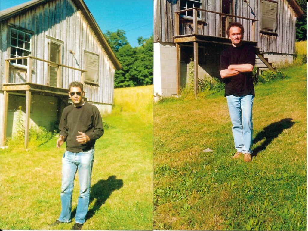 Two photos side by side, one of Paul Auster, one of Colin Matthews, both standing outside the same wooden building.