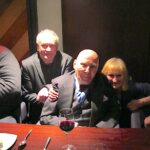 Hans Werner Henze poses for a photo between Colin and Belinda Matthews. Another man (Olly Knussen) is just visible next to Colin.